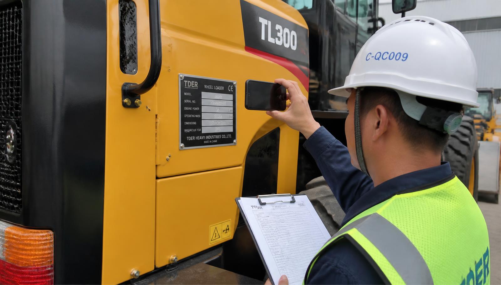 Pre-shipment inspection of a wheel loader serial number nameplate